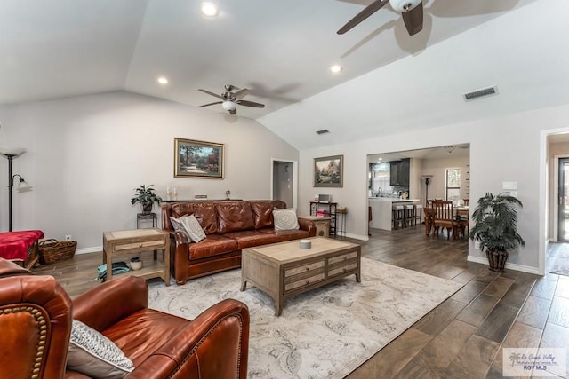 1916 Loquat Dr, Harlingen, TX 78552 - living area with a ceiling fan, lofted ceiling, baseboards, recessed lighting, and wood finished floors