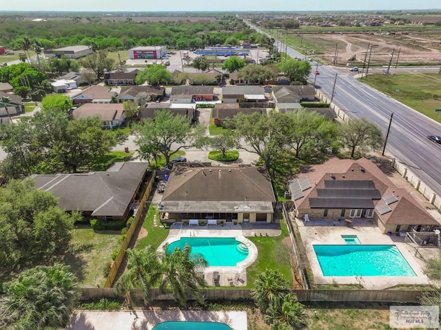 1916 Loquat Dr, Harlingen, TX 78552 - aerial view of residential area featuring a pool area