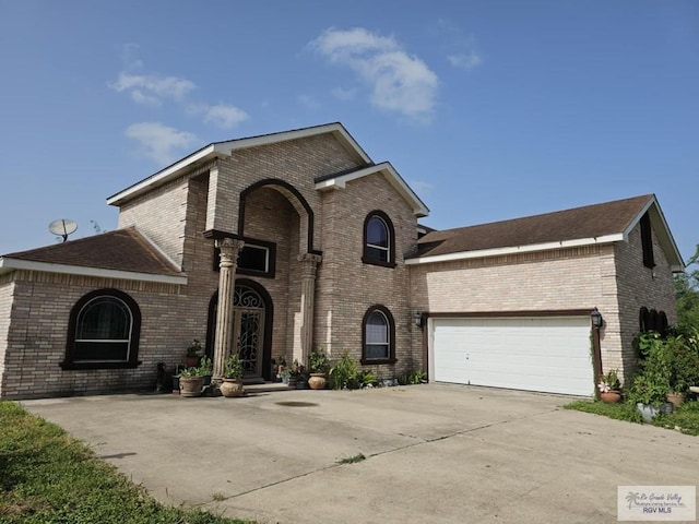 view of front of property with a garage