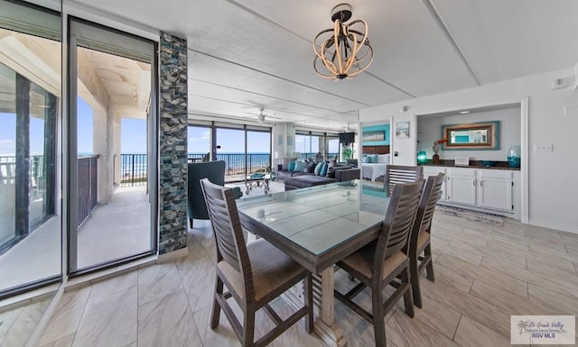 3000 Gulf Blvd, South Padre Island, TX 78597 - dining area with a chandelier