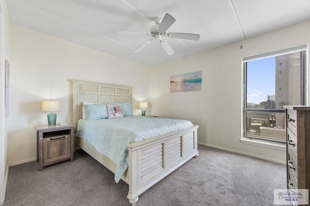 3000 Gulf Blvd, South Padre Island, TX 78597 - carpeted bedroom with baseboards and a ceiling fan