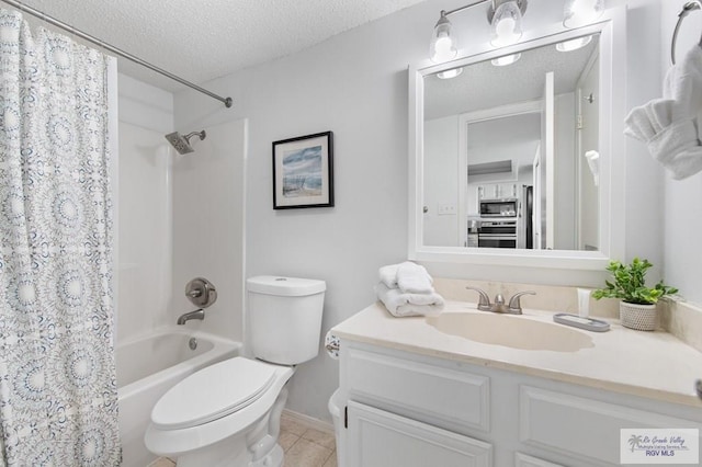 3000 Gulf Blvd, South Padre Island, TX 78597 - full bath with a textured ceiling, vanity, shower / bath combination with curtain, and tile patterned floors
