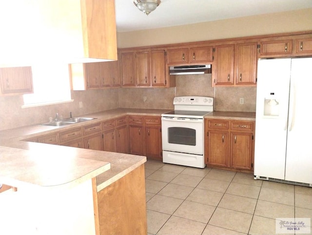 kitchen with white appliances, kitchen peninsula, sink, and light tile patterned floors