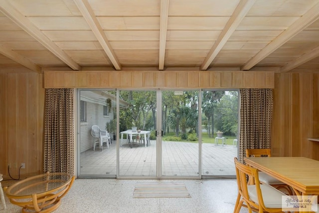 doorway with wooden walls