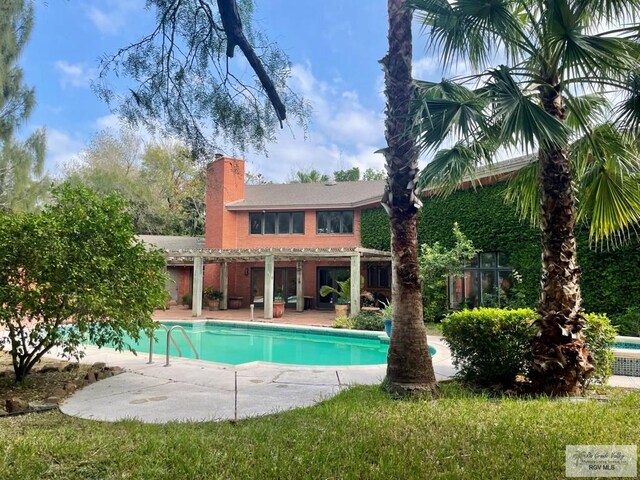 view of pool with a patio