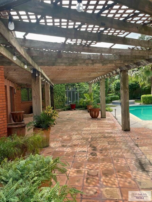 view of patio featuring a pergola