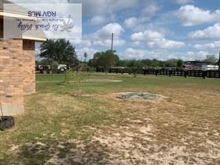 view of yard with a rural view