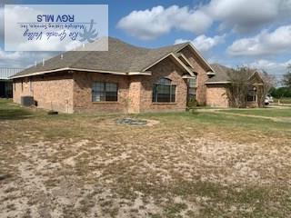 view of front of property with a front lawn