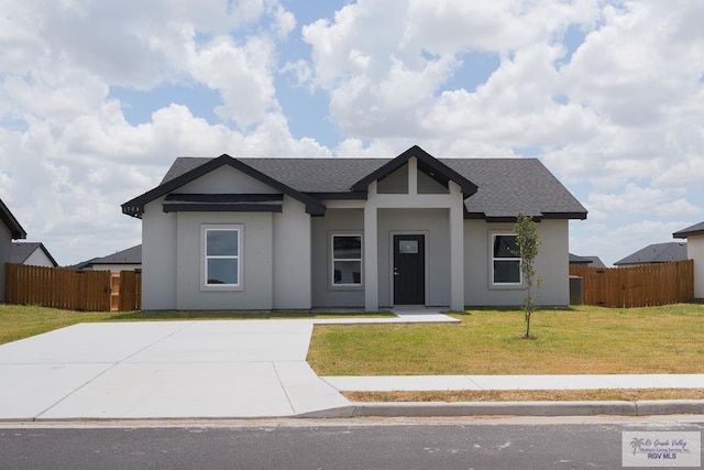 view of front of home with a front lawn