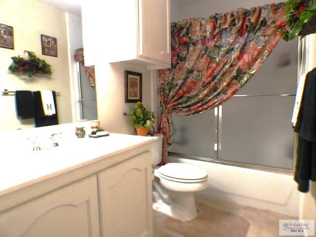 3319 Country Club Dr, Edinburg, TX 78542 - full bath with toilet, vanity, and enclosed tub / shower combo