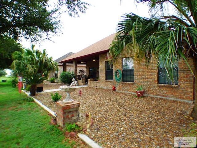 3319 Country Club Dr, Edinburg, TX 78542 - view of green lawn featuring a patio area