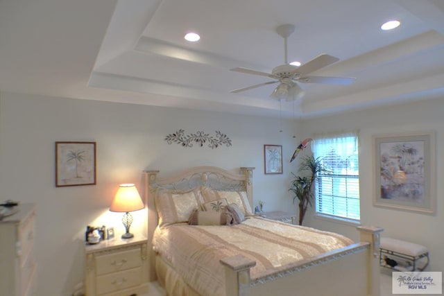 3319 Country Club Dr, Edinburg, TX 78542 - bedroom with a tray ceiling, recessed lighting, and a ceiling fan