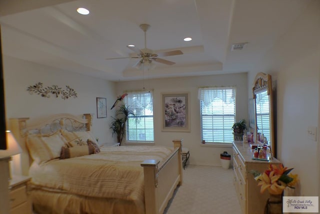 3319 Country Club Dr, Edinburg, TX 78542 - bedroom featuring a raised ceiling, light colored carpet, baseboards, recessed lighting, and a ceiling fan