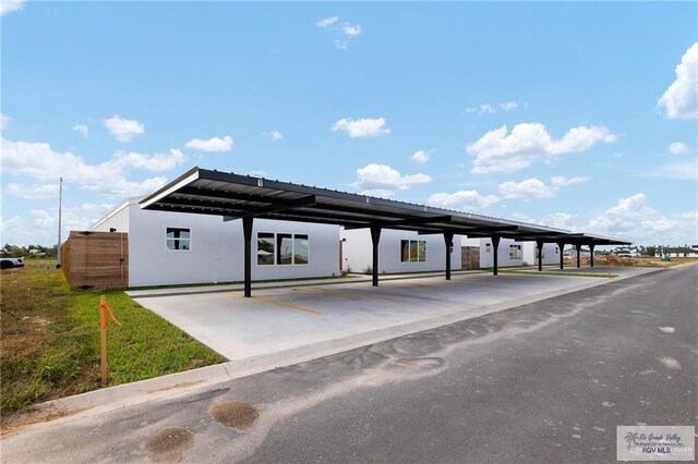 view of car parking with a carport