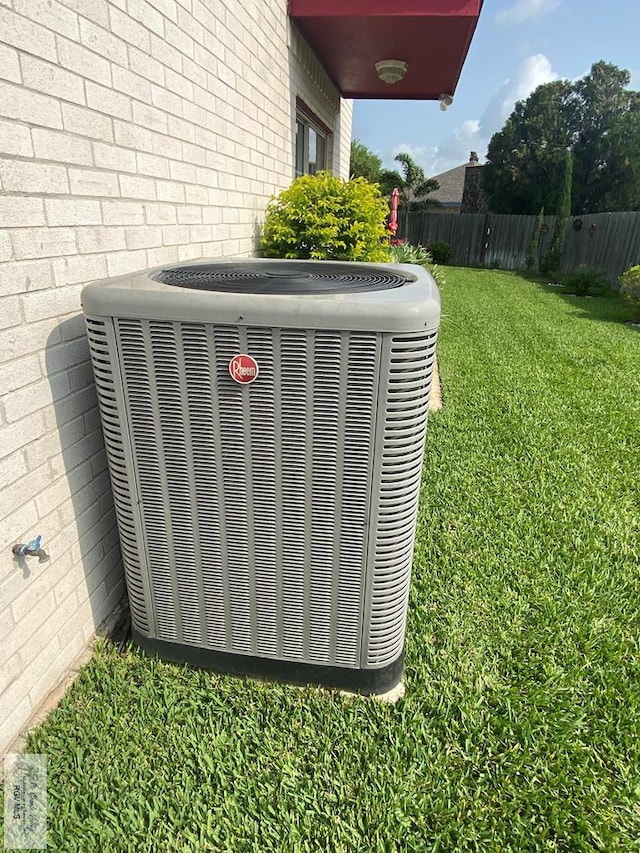 details with central AC and fence