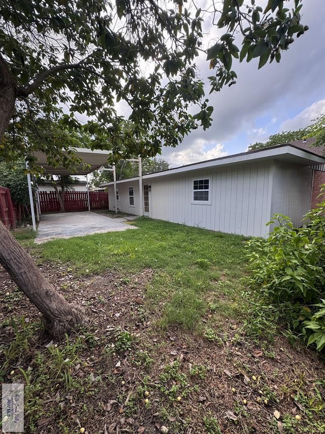 118 E Matz Ave, Harlingen, TX 78550 - rear view of property featuring a patio