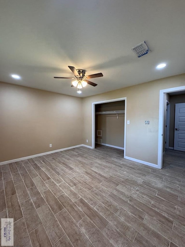 118 E Matz Ave, Harlingen, TX 78550 - unfurnished bedroom featuring wood finished floors, recessed lighting, ceiling fan, and a closet
