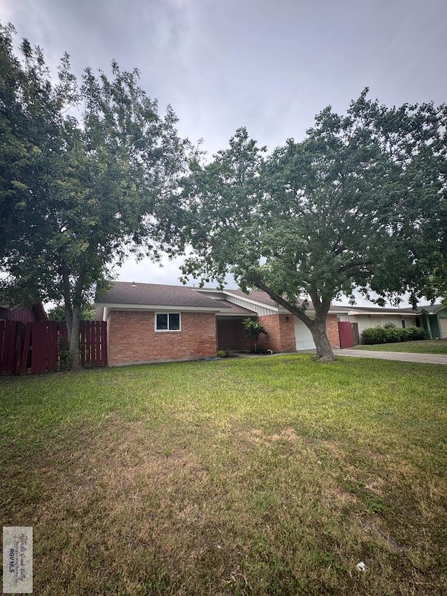 118 E Matz Ave, Harlingen, TX 78550 - view of home's exterior with brick siding