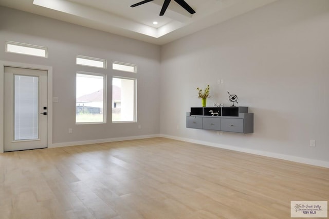 interior space featuring light wood-type flooring and ceiling fan