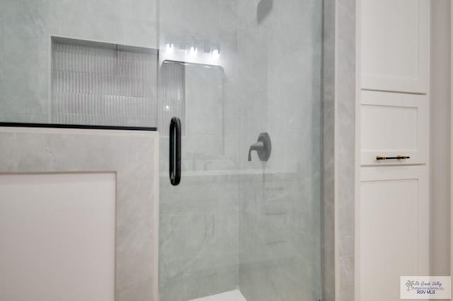 bathroom featuring walk in shower