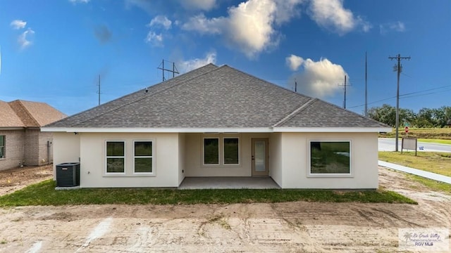 back of house with a patio and central AC unit