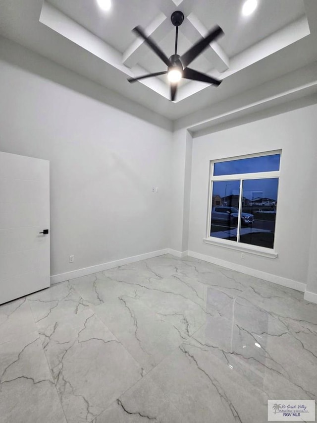 121 Finch Dr, Los Fresnos, TX 78566 - empty room with marble finish floors, a tray ceiling, recessed lighting, and ceiling fan