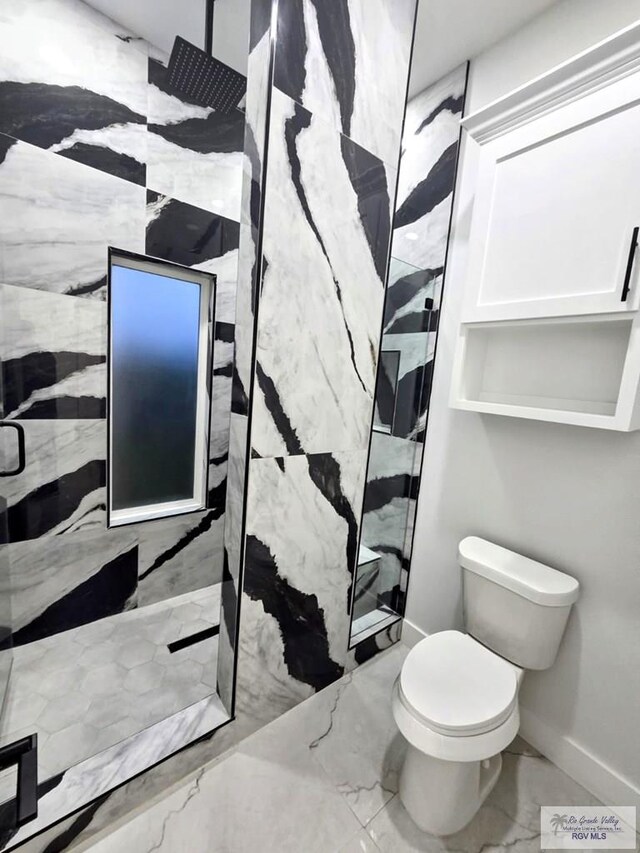121 Finch Dr, Los Fresnos, TX 78566 - full bath featuring marble tiled floors and a marble finish shower