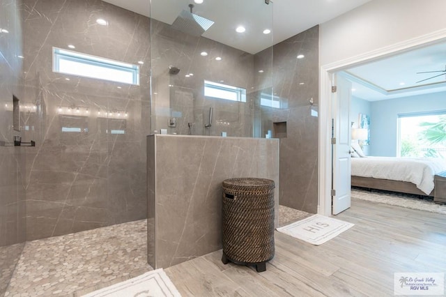 38 Spoonbill Cove Rd, Laguna Vista, TX 78578 - bathroom with walk in shower, healthy amount of natural light, and wood finished floors