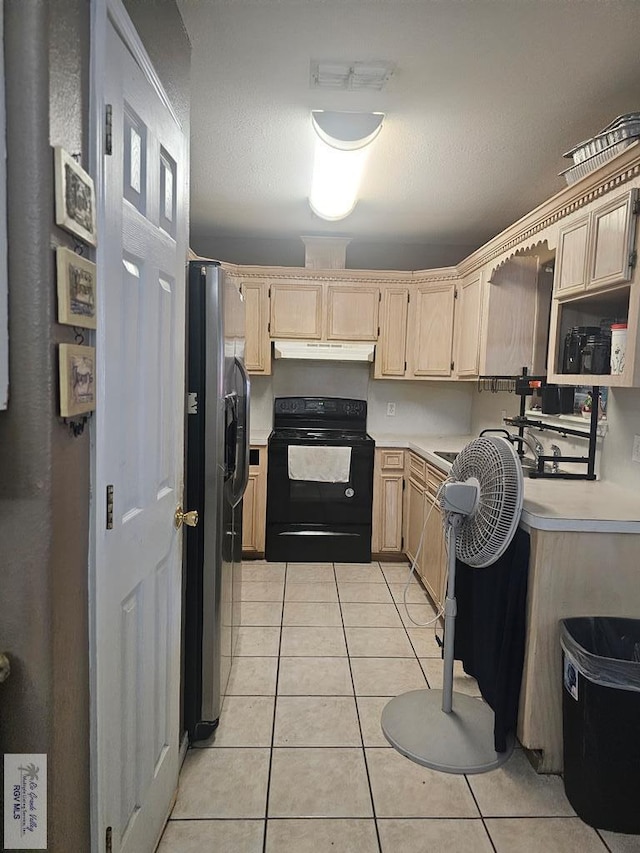 kitchen featuring stainless steel fridge with ice dispenser, light tile patterned flooring, black range with electric stovetop, and light brown cabinetry