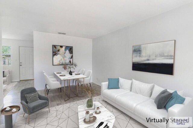 225 Chelo Dr, La Feria, TX 78559 - living room featuring visible vents