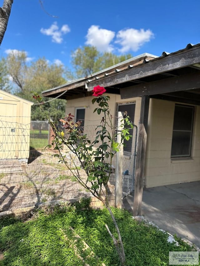 view of property exterior featuring a patio