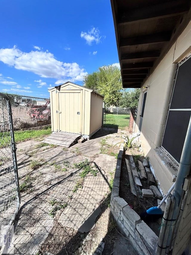 view of patio featuring a shed