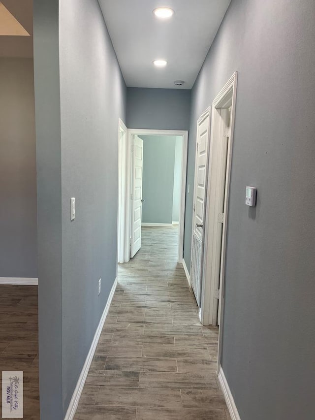 hallway featuring light hardwood / wood-style flooring