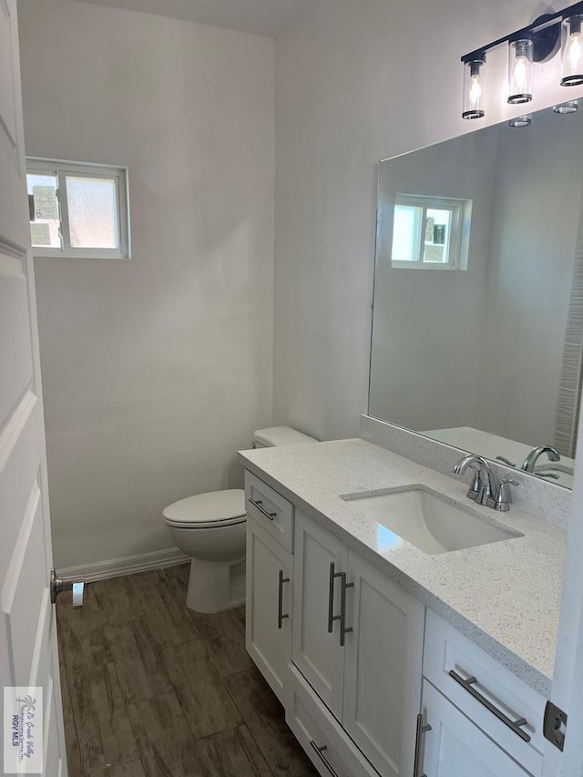 6214 Bentwood Dr, Harlingen, TX 78552 - bathroom with plenty of natural light and vanity