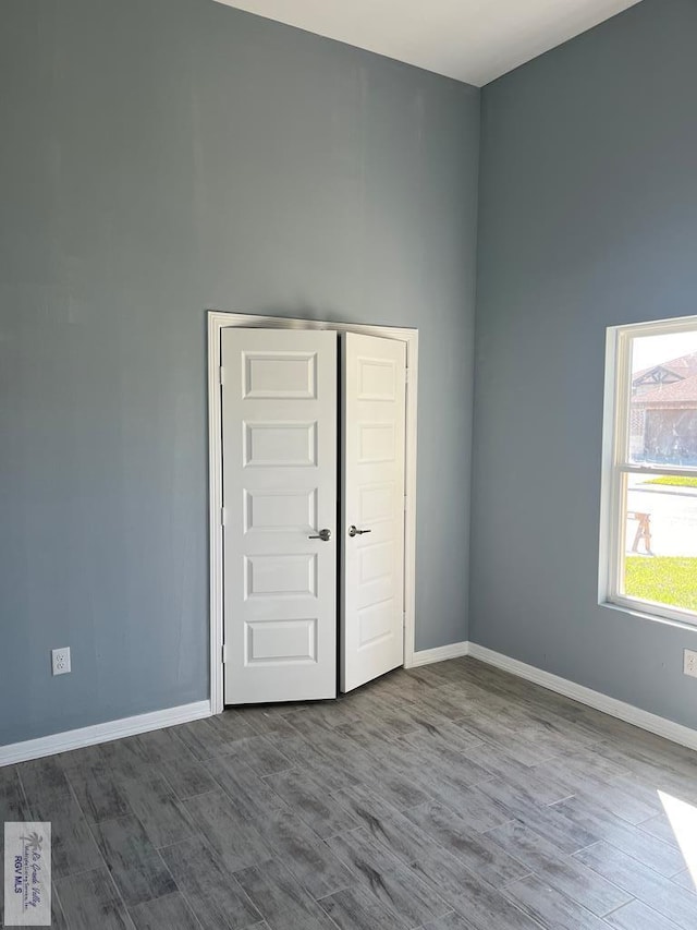 6214 Bentwood Dr, Harlingen, TX 78552 - empty room with dark wood finished floors