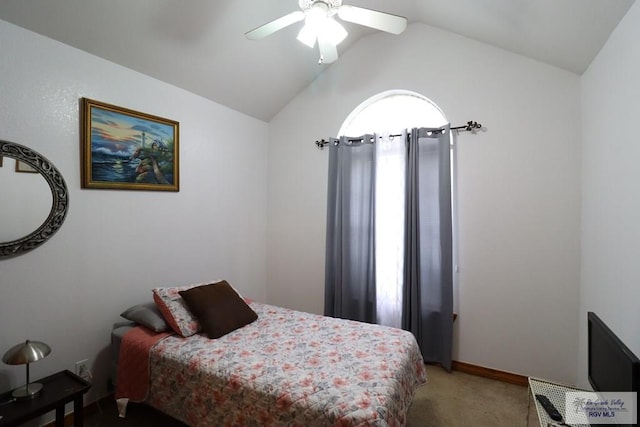 carpeted bedroom featuring ceiling fan and lofted ceiling