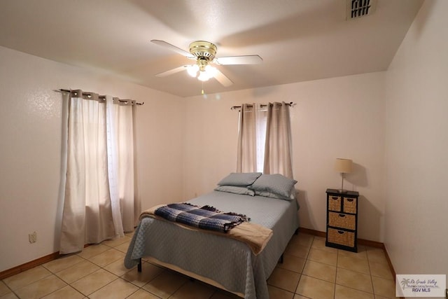 bedroom featuring ceiling fan and light tile patterned floors