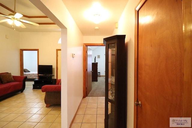 hallway featuring light tile patterned floors