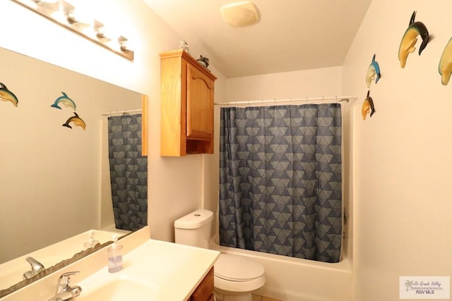 full bathroom with toilet, shower / tub combo, and vanity