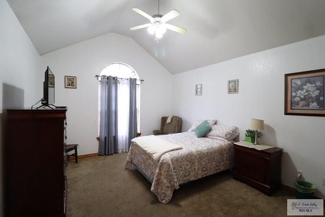 carpeted bedroom featuring ceiling fan and vaulted ceiling