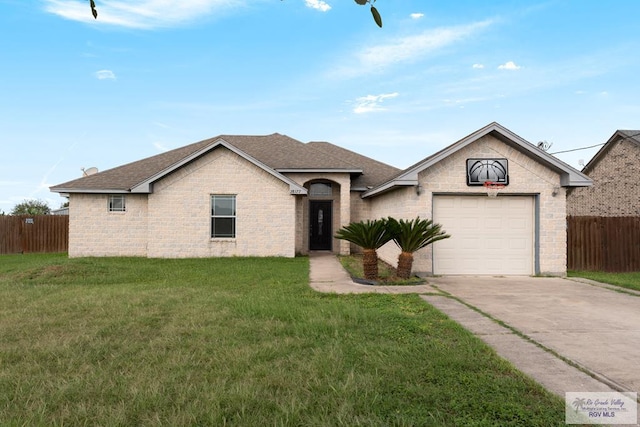 single story home featuring a garage and a front lawn