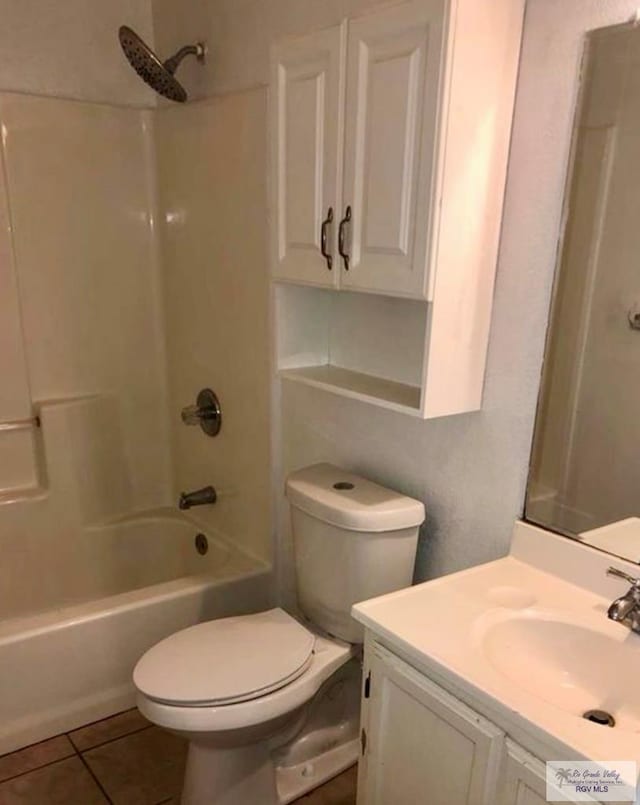 full bathroom with toilet, vanity, bathing tub / shower combination, and tile patterned floors