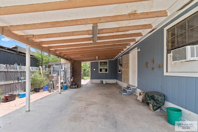 view of patio featuring cooling unit and fence