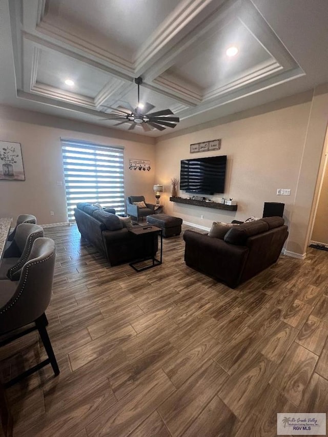 living room featuring coffered ceiling, baseboards, dark wood finished floors, and a ceiling fan