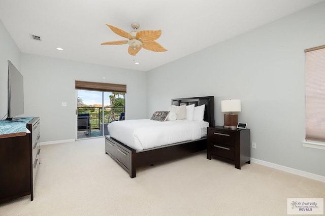 carpeted bedroom featuring access to exterior and ceiling fan