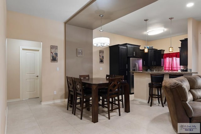 view of tiled dining space