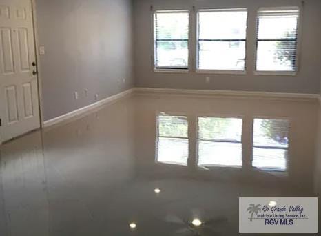 6212 NW King Arthur Ct, Harlingen, TX 78550 - unfurnished room featuring baseboards