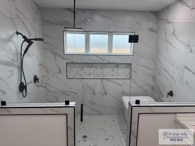 bathroom featuring vanity and walk in shower