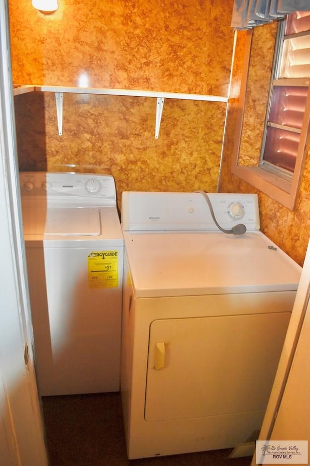 laundry area featuring washer and clothes dryer