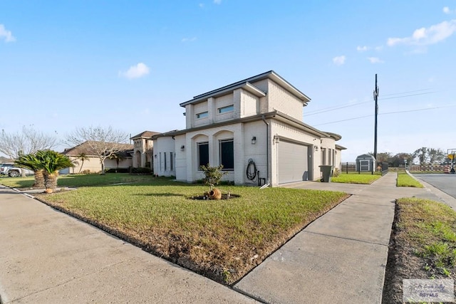 view of front of home with a garage and a front yard